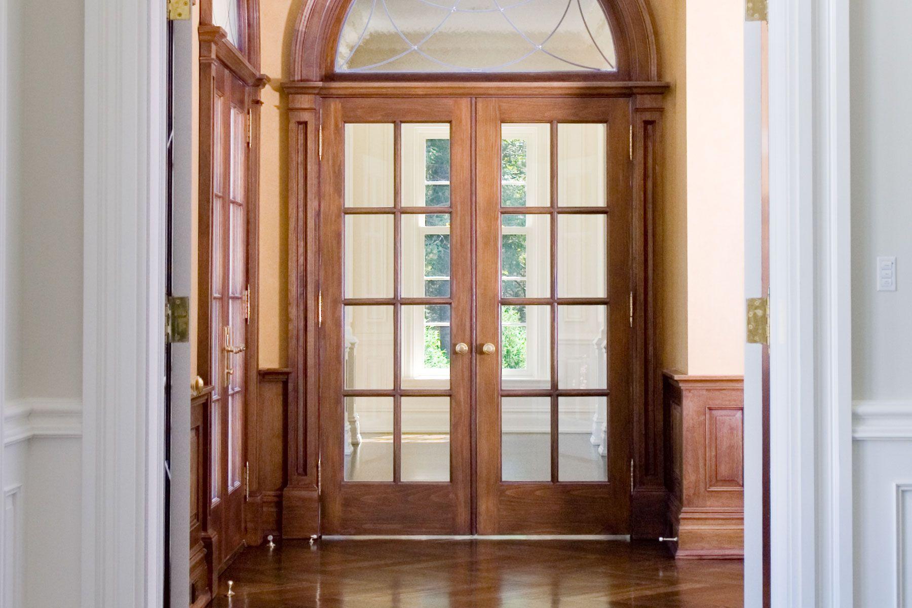 interior double french doors with large arched transom